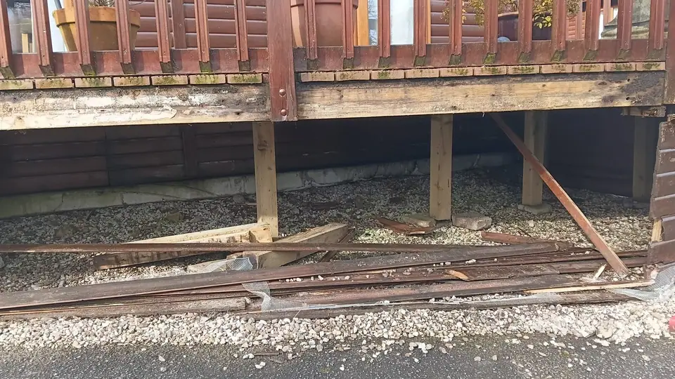 Exposed deck supports with the old boards removed